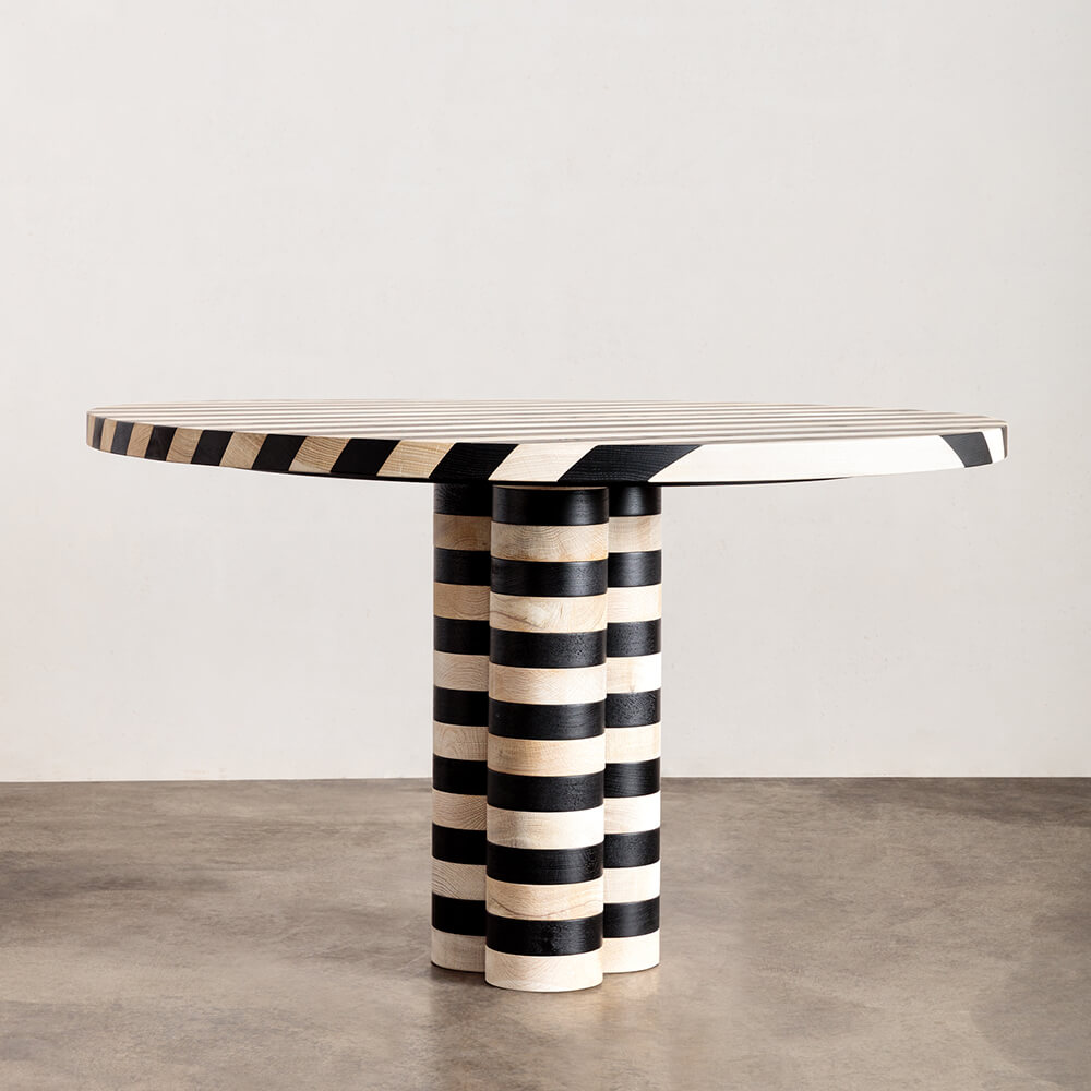 OBLIQUE ROUND DINING TABLE